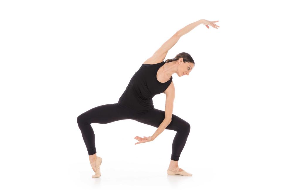 An adult dancer participating in an Adult Barre Fitness class.