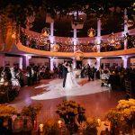 A bride and groom dancing at a wedding reception at the Joseph D. Carrier Art Gallery.