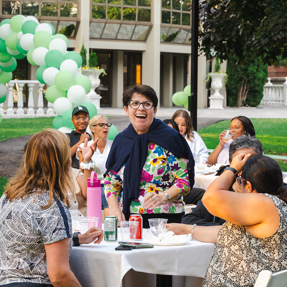 Villa Charities Staff seen celebrating an occassion at the Columbus Centre's Anthony Fusco Sr. Courtyard