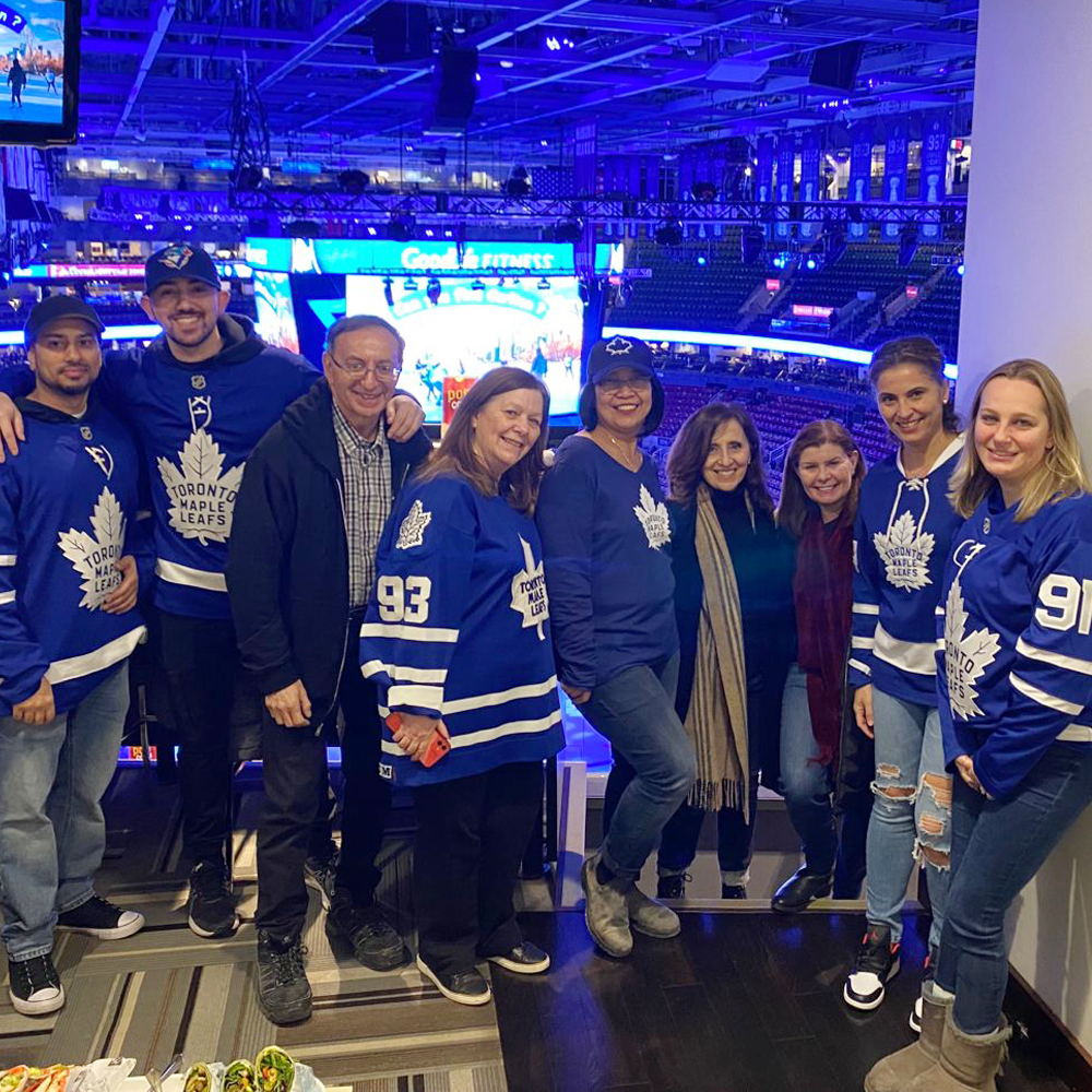 A mix of Villa Charities employees seen wearing Maple Leafs jersey at the Scotiabank Arena