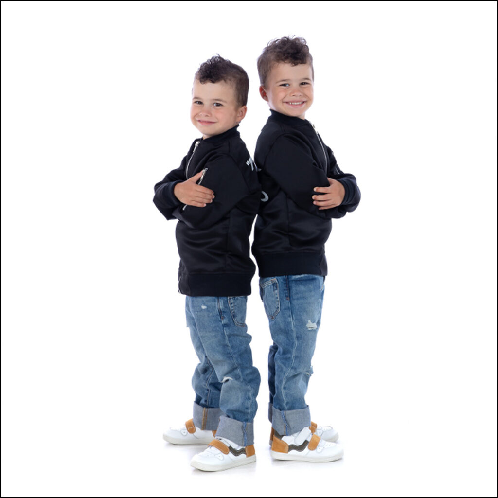 2 boys seen posing