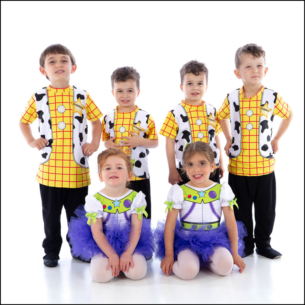 4 boys and 2 girls dressed in costumes