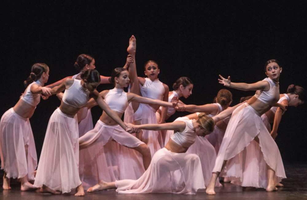 DanzArts Toronto dancers performing during a dance recital.