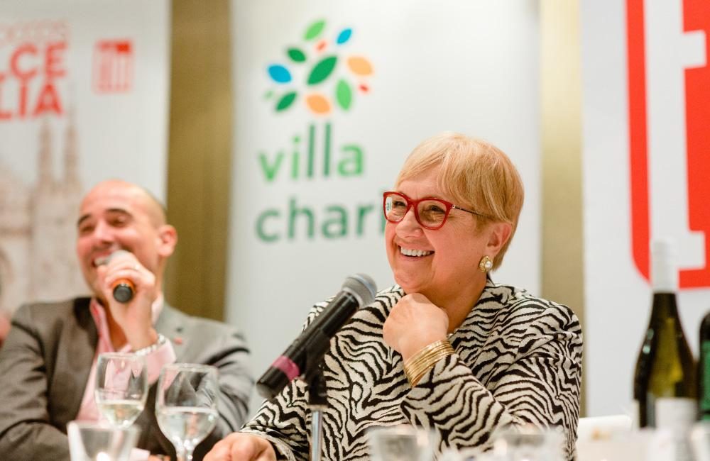 Celebrity chefs David Rocco and Lidia Bastianich answer questions during the TLN Experience event .