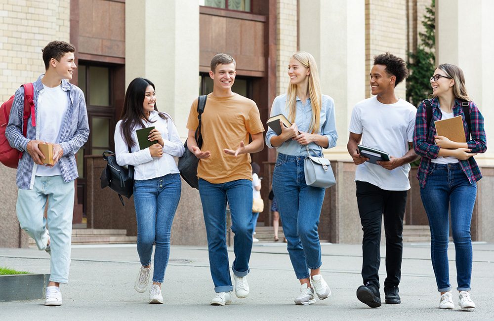 A group of students walking in a university