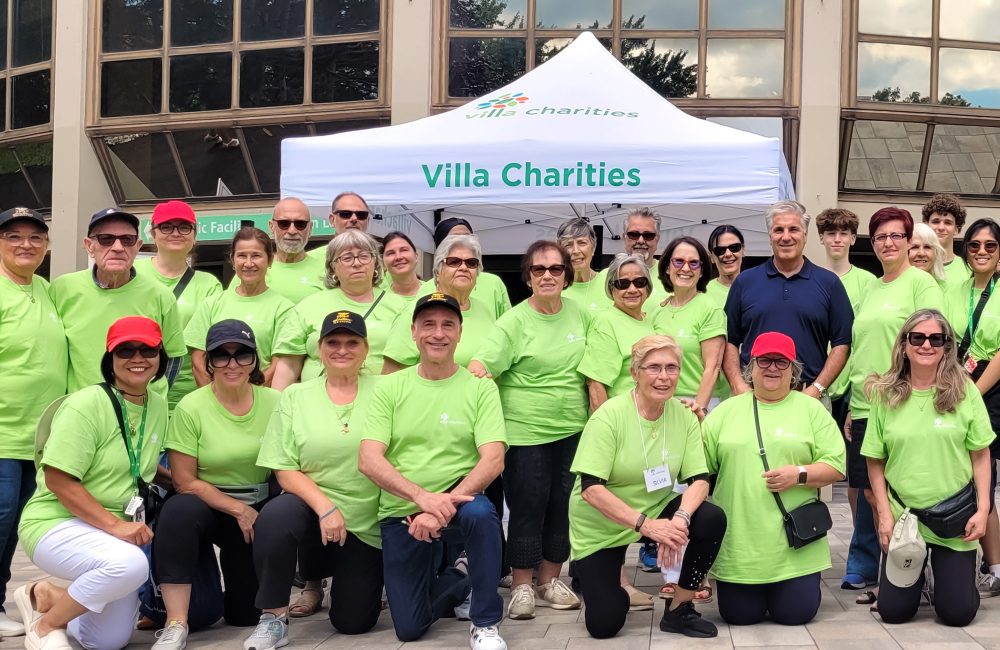 Villa Charities Volunteers seen posing as group after an event in front of the Columbus Centre