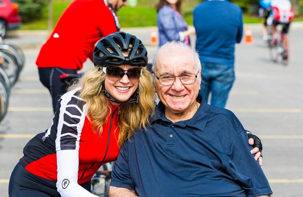 Two people posing for a photo at GIRO.